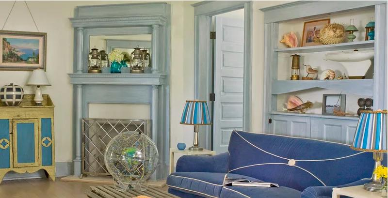 Sau cải tạo, không gian phòng khách chỉ gồm những gam màu cơ bản. Tông màu xanh mang đến vẻ đẹp hiện đại, sự dịu dàng, bình yên. phòng khách hiện đại